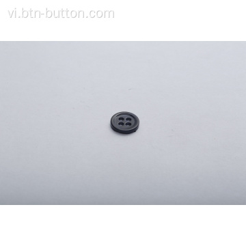 Nút vỏ được sử dụng trong áo len dệt kim
